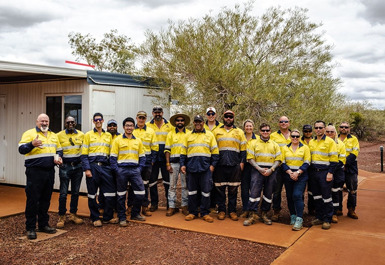 RE:GROUP Employees pose for a photo on a mine site in the Pilbara